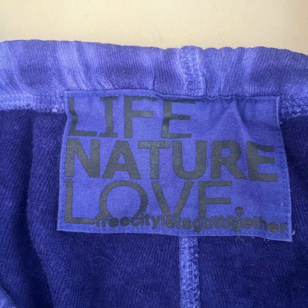 FreeCity ¾ sweatpants.  Bright blue color.  Size 0/XS